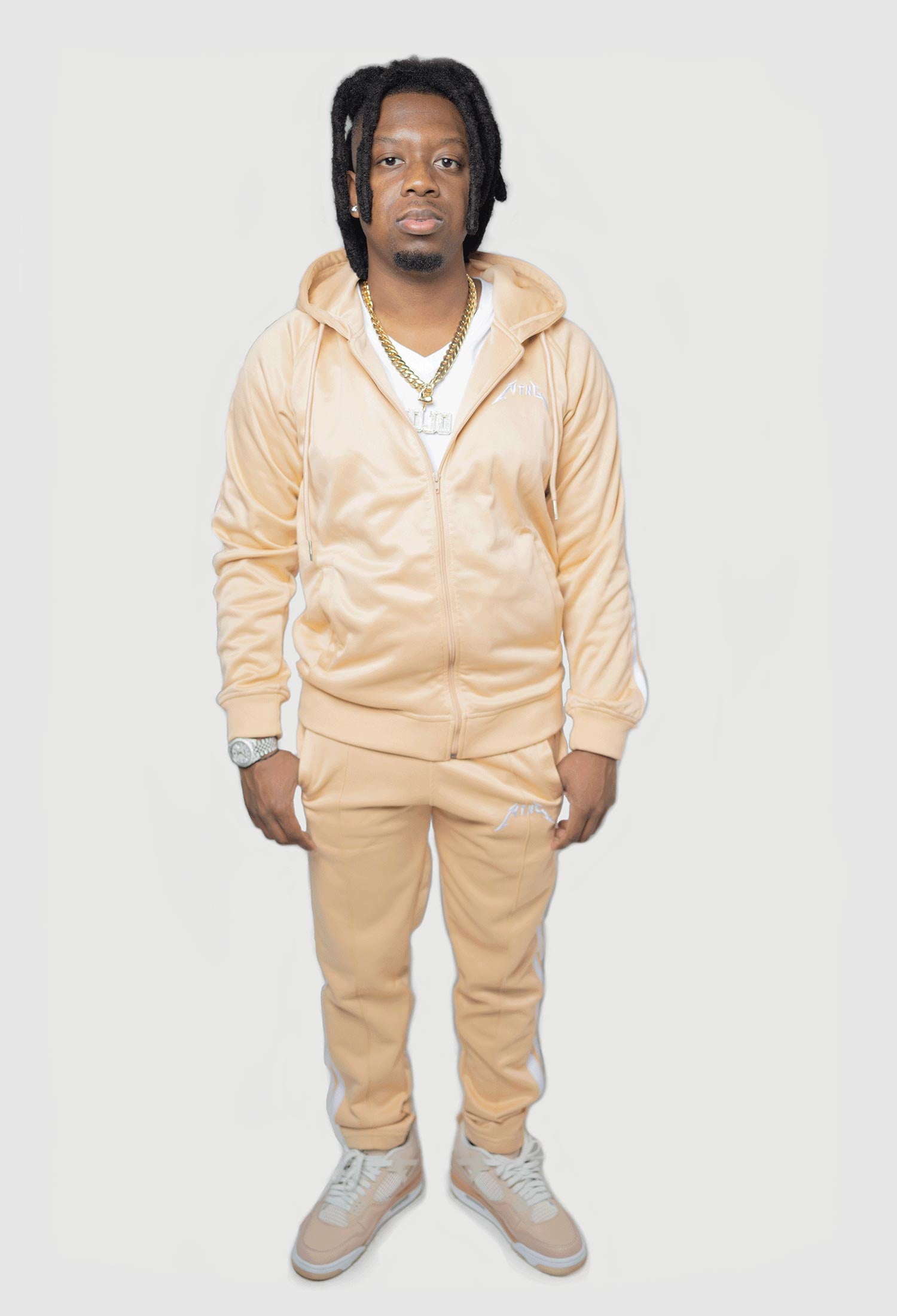MODEL WEARING SIZE M NUDE TRACKSUIT 