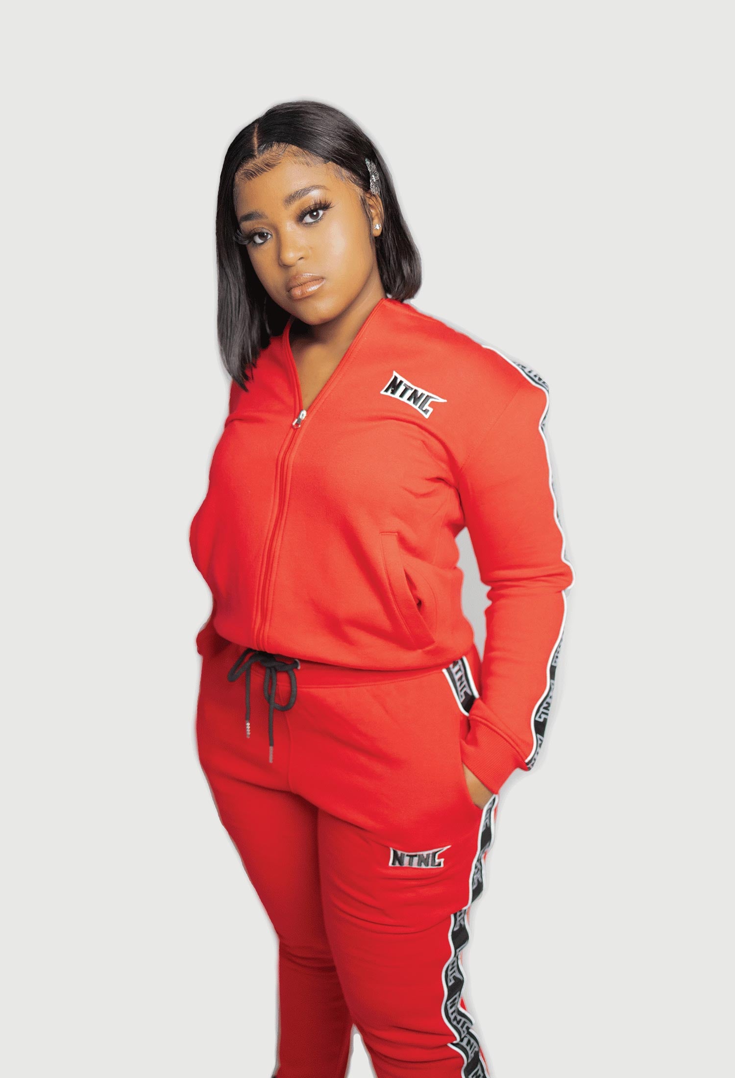 FEMALE MODEL WEARING SIZE M RED 3M TRACKSUIT 